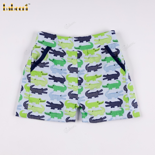 Blue and green crocodile print shorts.- BB3562