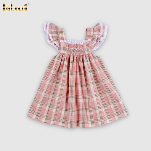 A loose-fitting dress with pleated details in pink and brown checkered pattern.- BB3571